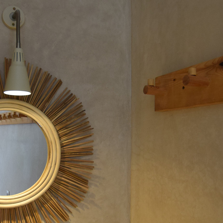 Mirror and faucet in private room bathroom